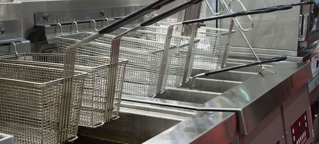 Row of clean fryers - Deep Fryer Safety Tips