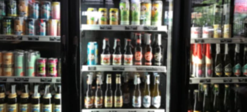 blurred fridges with beer and alcohol - Underbar Refrigerator Water Line Cleaning