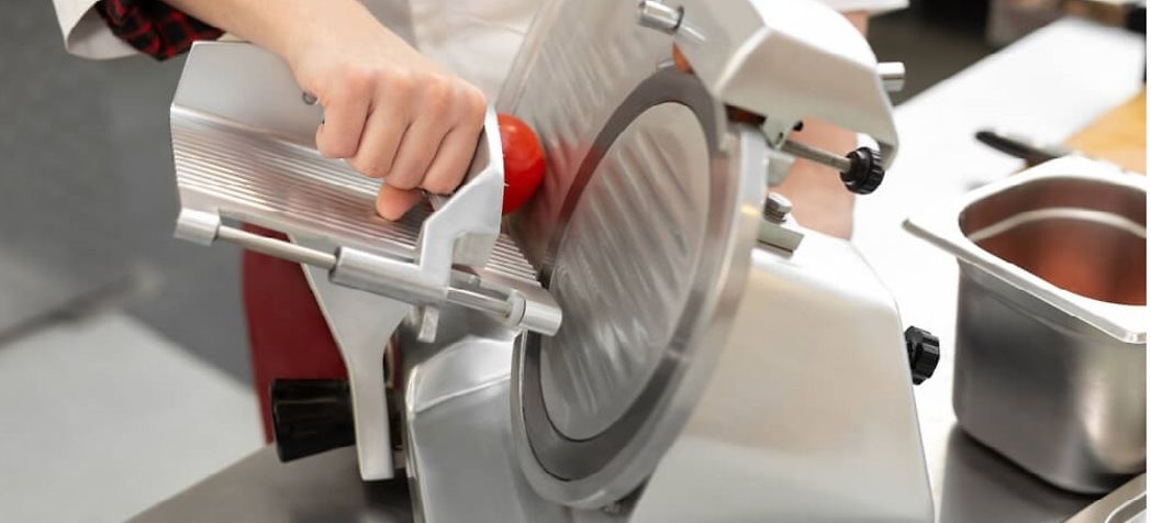 How to use a Nemco slicer - chef slicing tomatos