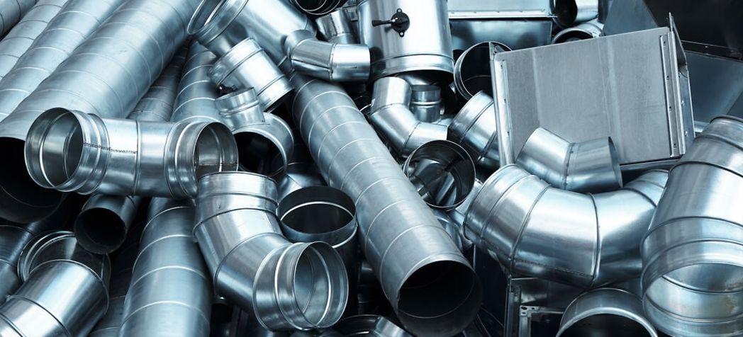 Pile of different HVAC duct types and shapes - Types of HVAC ducts