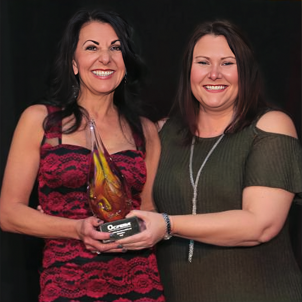 Liz Lorino receiving award