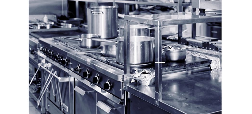 A commercial kitchen range with pots and pans - Jade range troubleshooting 