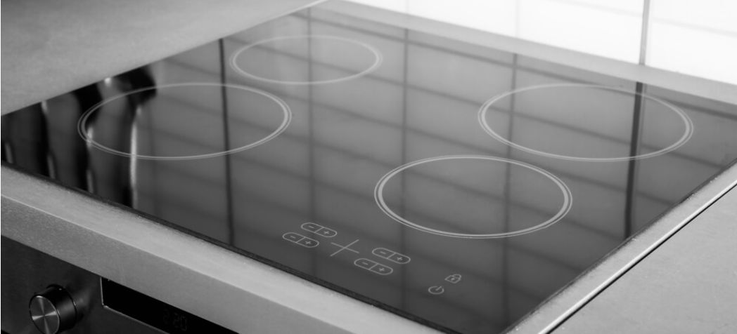  Clean and empty black induction stovetop - Smooth top electric range vs induction 