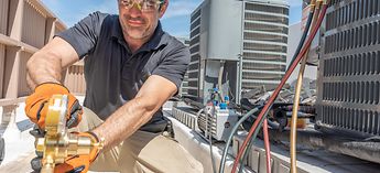 HVAC Technician Working