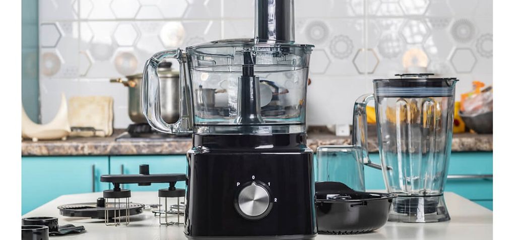 Black food processor with several attachments - How do you lubricate a food processor 