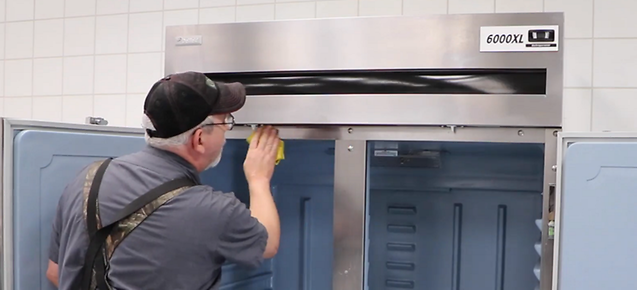 Picture - Cleaning a Delfield Refrigeration Unit