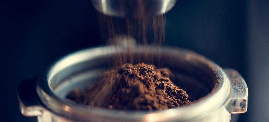 Closeup of Ground Espresso Beans - HeyCafe Grinder Cleaning