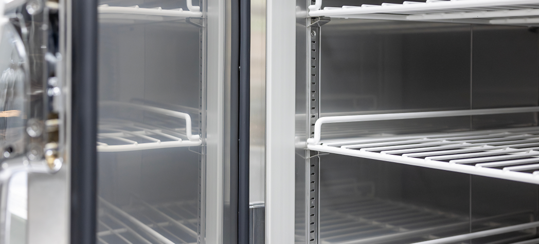 How to Dispose of Old Commercial Refrigerators - Open and empty refrigerator