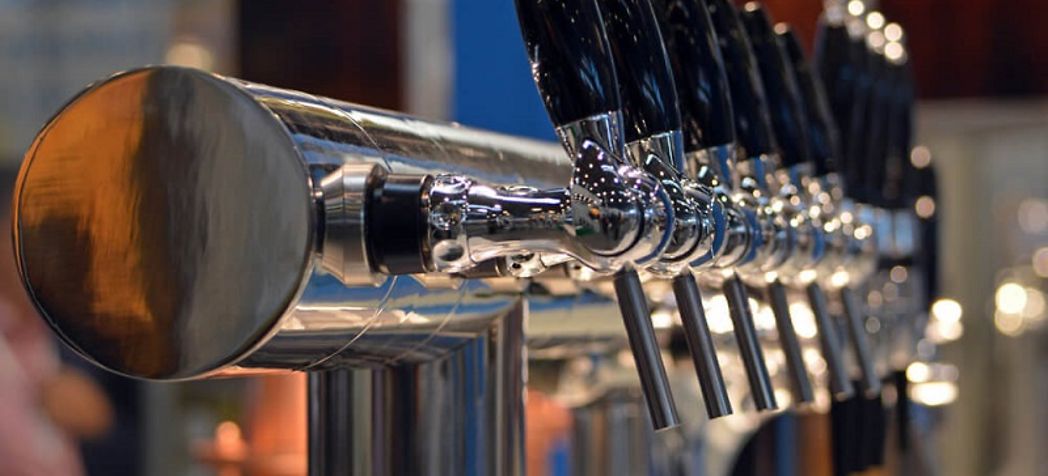 Row of beer taps - Lancer Beer Dispenser Cleaning & Maintenance 