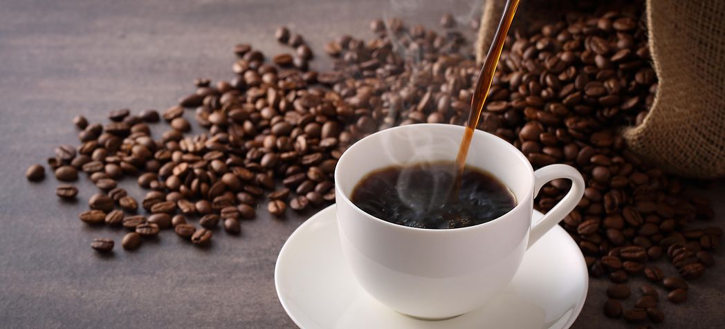 Coffee Cup with Coffee Beans - Coffee Maker Troubleshooting