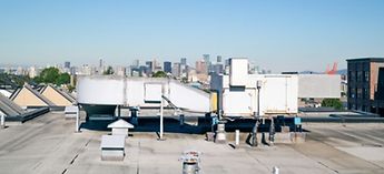 Commercial Make Up Air Unit on a roof - Accurex make up air unit troubleshooting