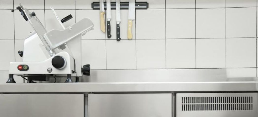 Clean commercial kitchen stainless steel - signs your equipment needs repair or replaced