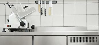 Clean commercial kitchen stainless steel - signs your equipment needs repair or replaced