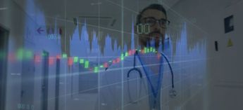 doctor standing behind viewing glass - ASHRAE standards for ventilation