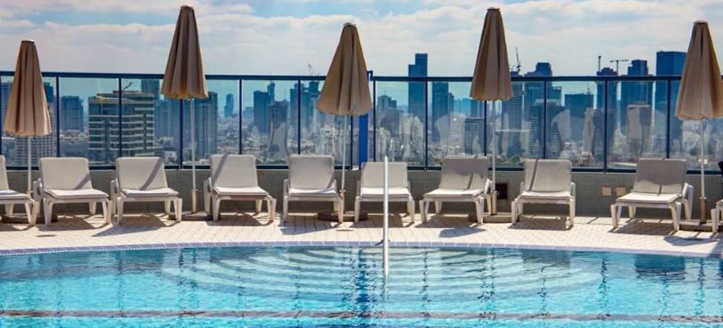 Commercial rooftop pool - Raypak pool heater cleaning