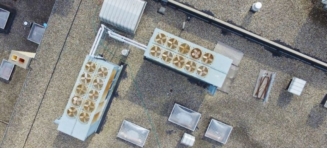 aerial view of commercial rooftop hvac system - reducing costs in commercial hvac