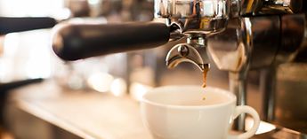 Espresso Machine Making Coffee - Coffee Shop Equipment List